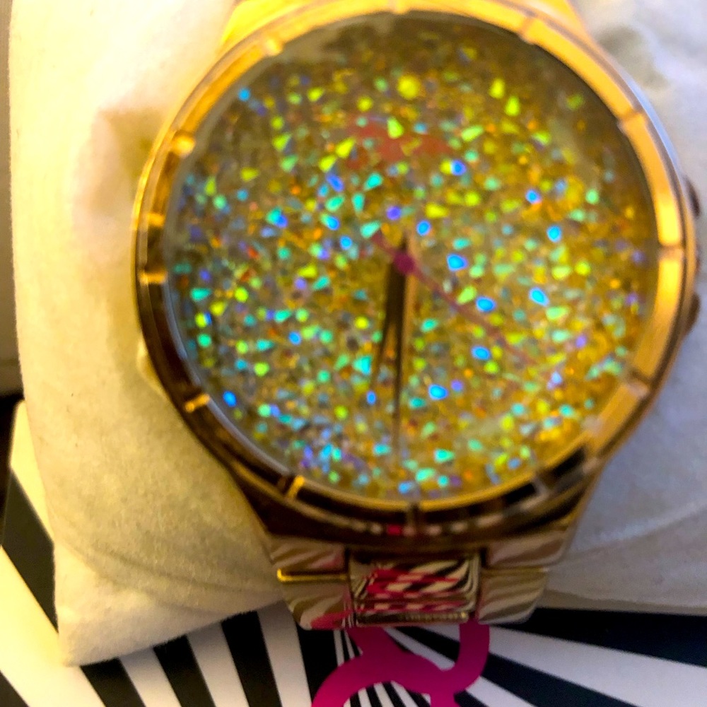 Boum Rose Gold Ladies Bracelet Watch With Colorful Crystal Facing.